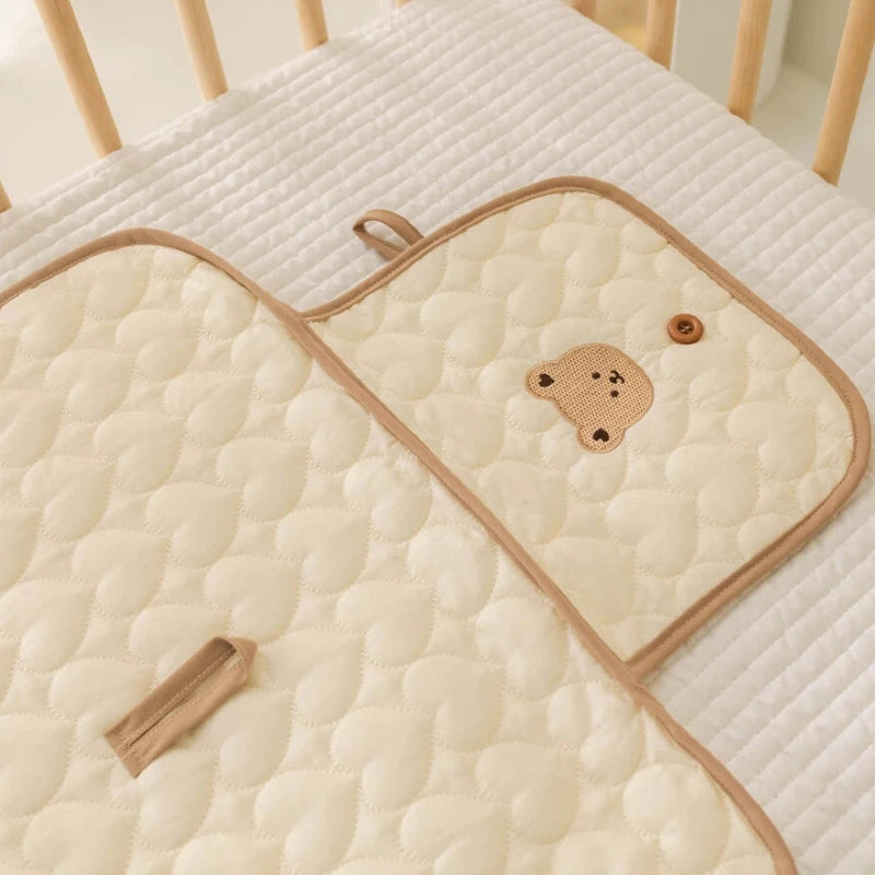 Matelas à langer pliable