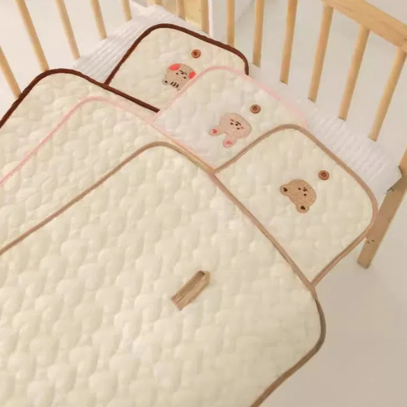 Matelas à langer pliable