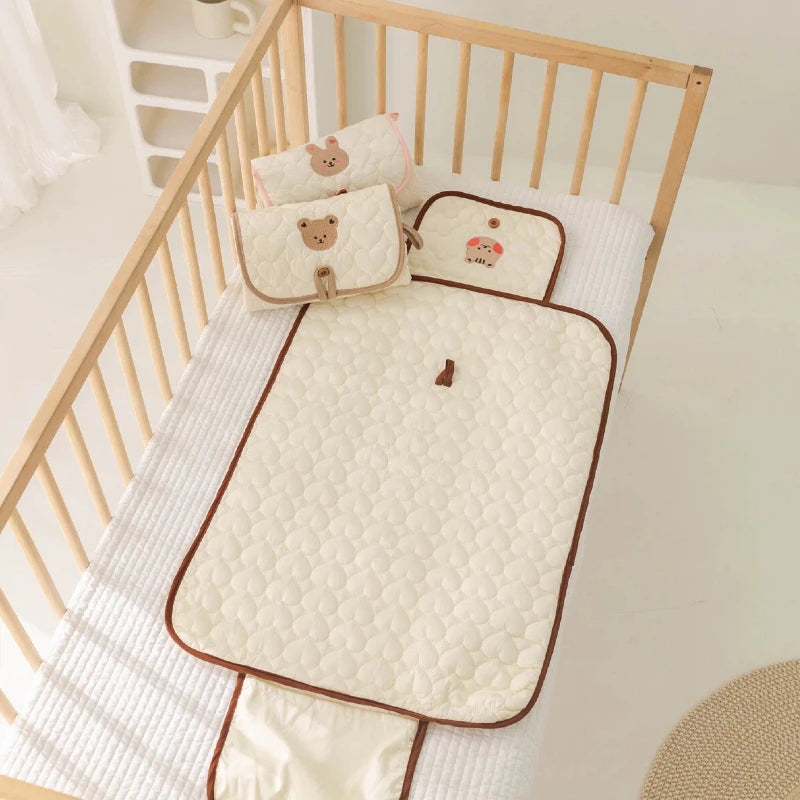 Matelas à langer pliable