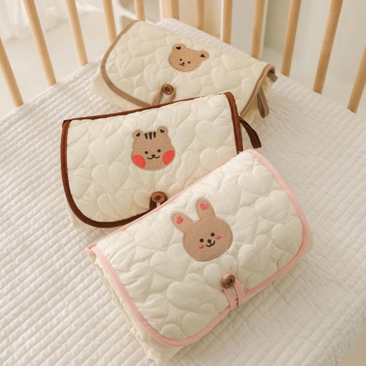 Matelas à langer pliable