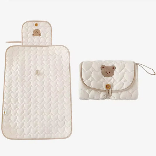Matelas à langer pliable
